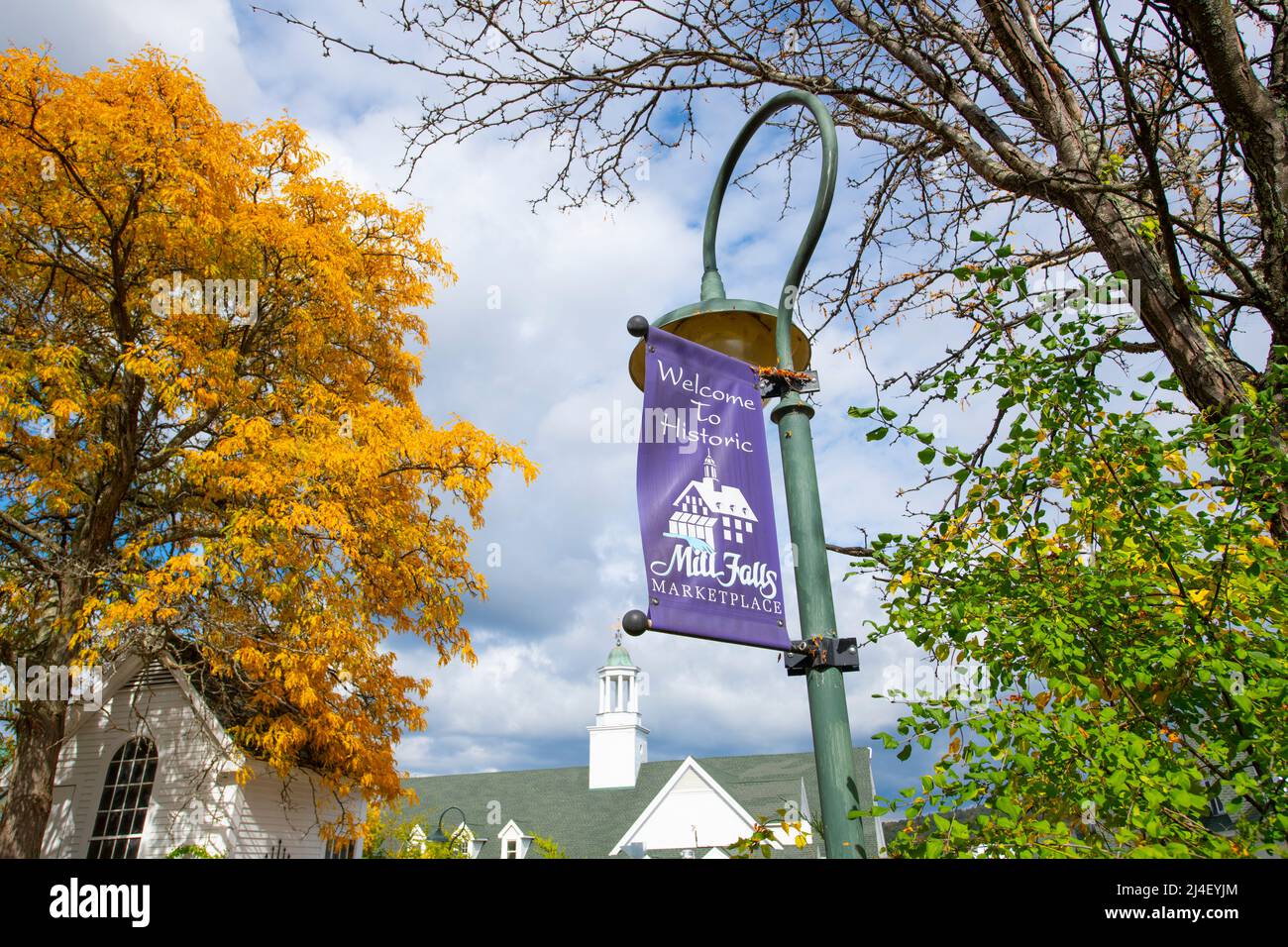 Sign of Welcome to Historic Mill Falls Marketplace in historic town