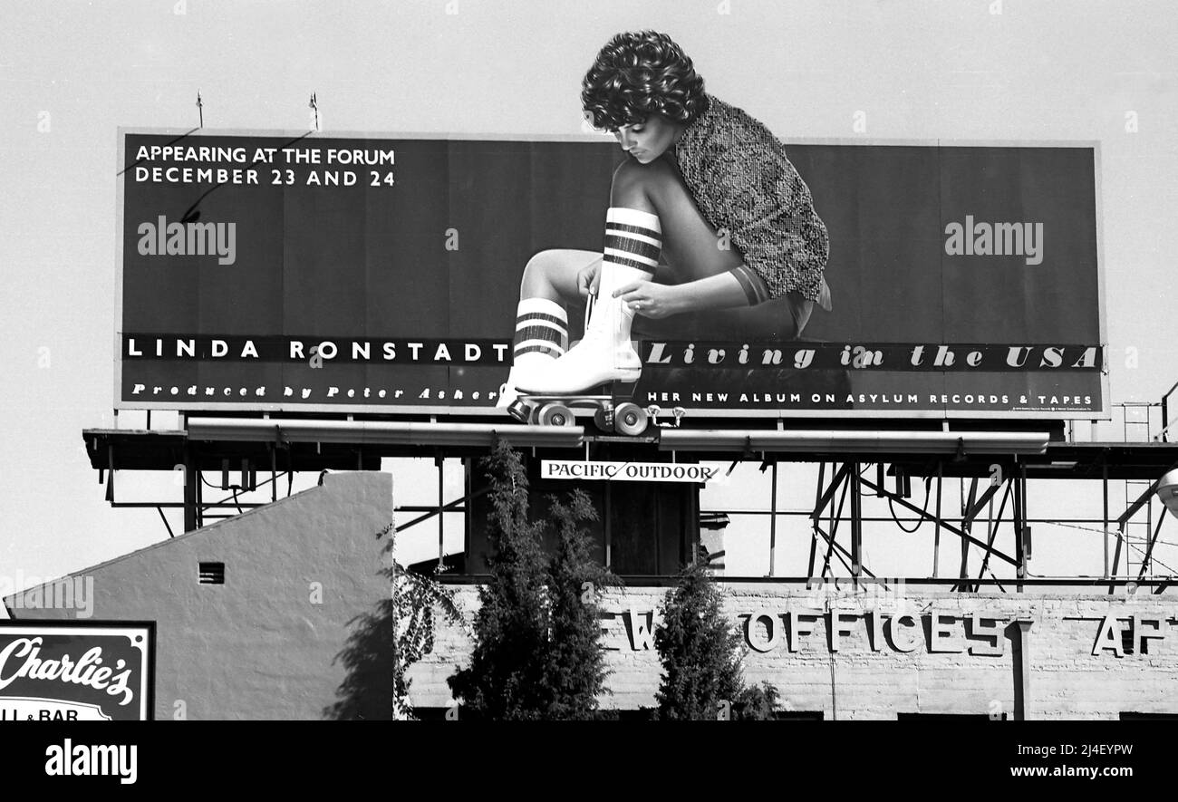A billboard promoting a new record album from Linda Ronstadt titled Living in the USA on the Sunset Strip in Los Angeles, CA, 1978 Stock Photo