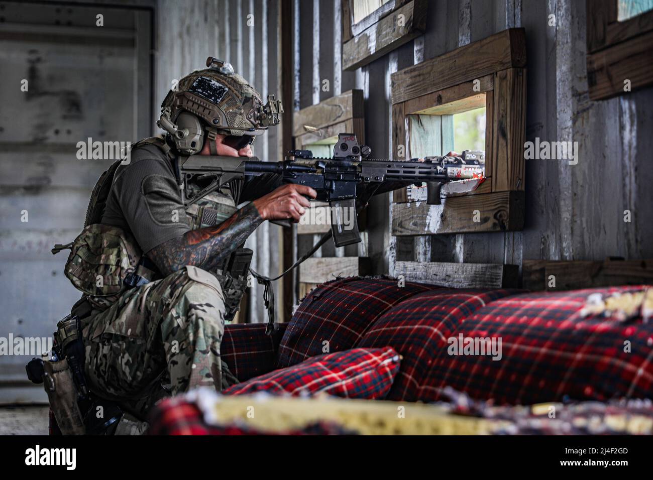 7th Special Forces Group (Airborne) Soldier shoots downrange during the