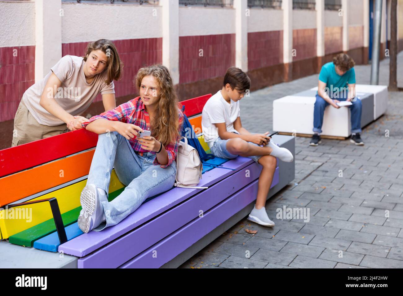 Teens listening gossip hi-res stock photography and images - Alamy