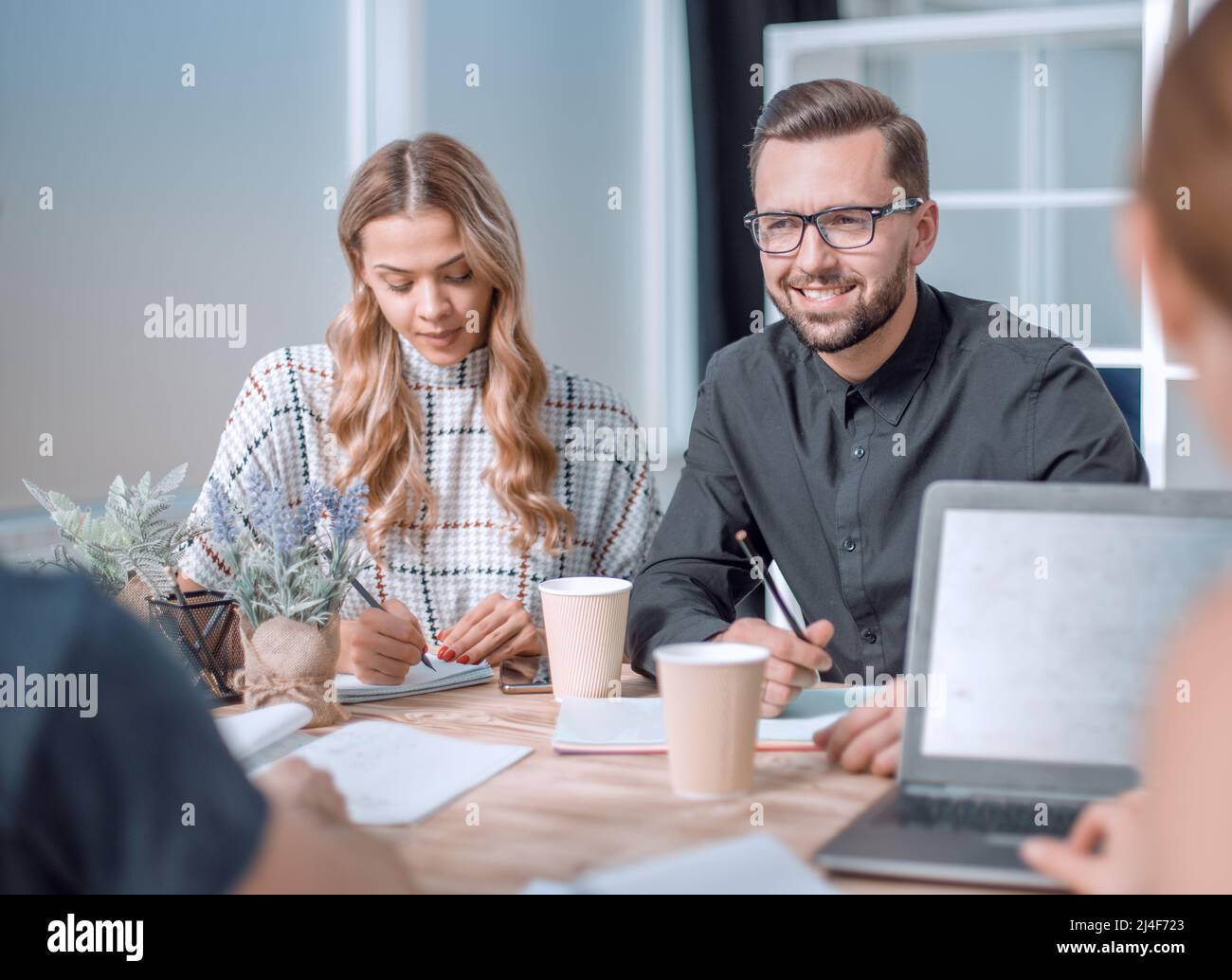 modern business team standing near the office Desk Stock Photo - Alamy
