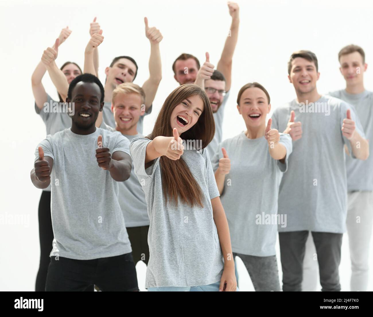 group of happy young people showing thumbs up Stock Photo - Alamy