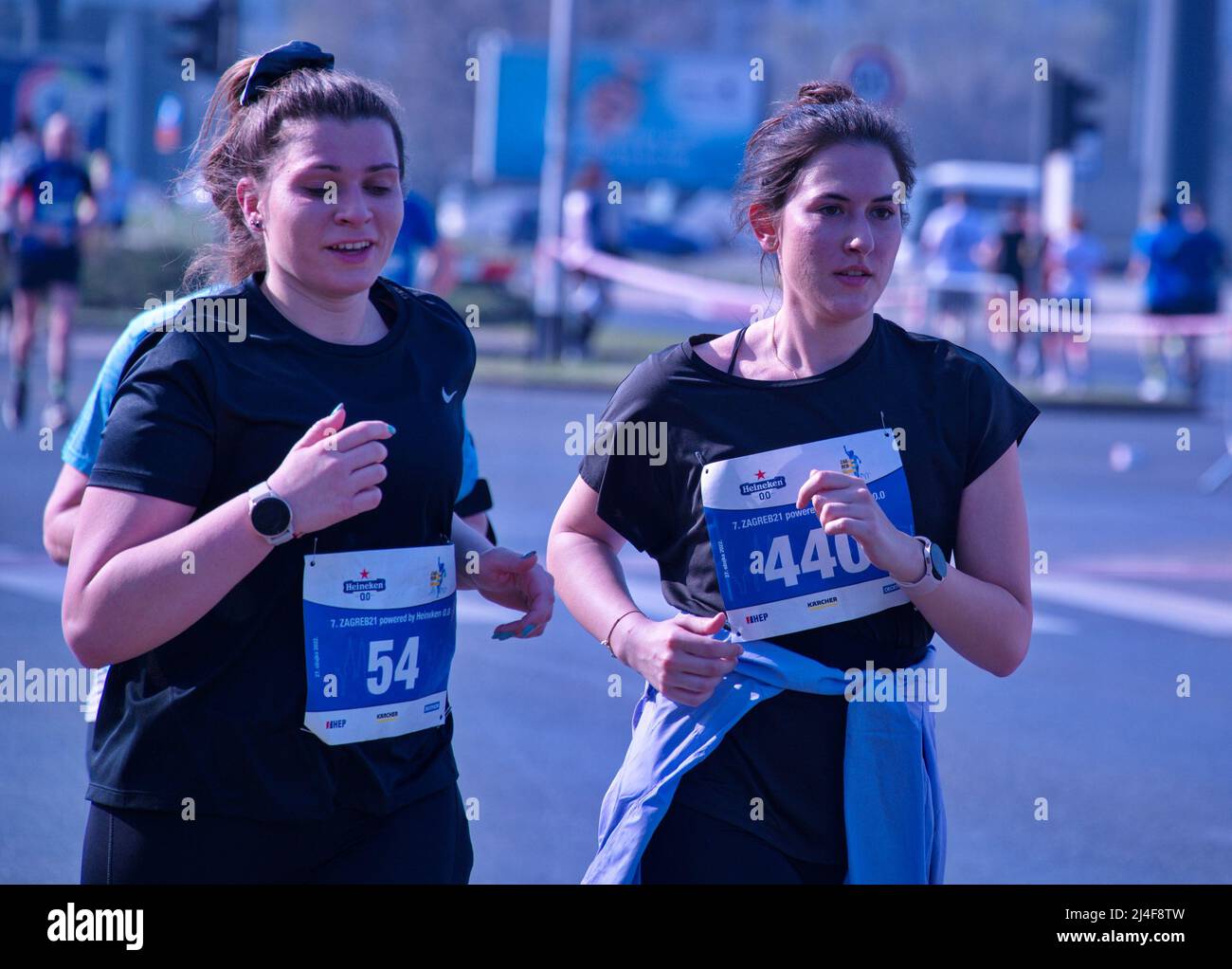 Active young women running marathon Stock Photo Alamy