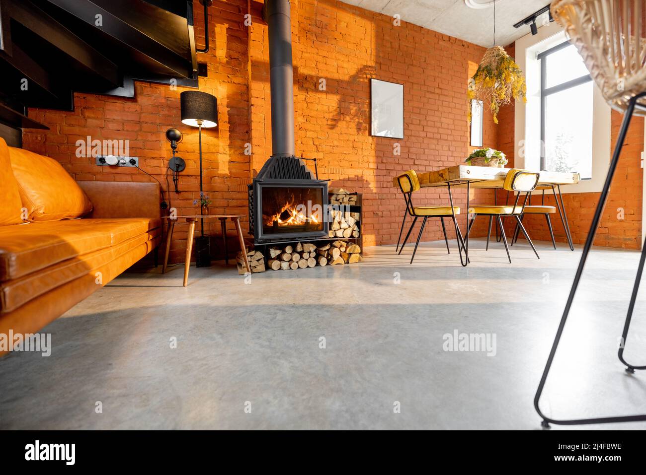 Cozy living room interior in loft style Stock Photo - Alamy