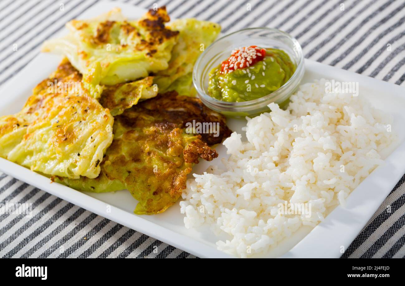 Cabbage in batter rice hi-res stock photography and images - Alamy