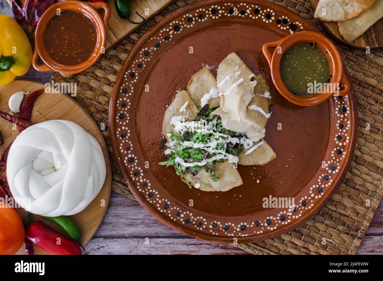 Mexican quesadillas with cheese and salsa sauce traditional food in