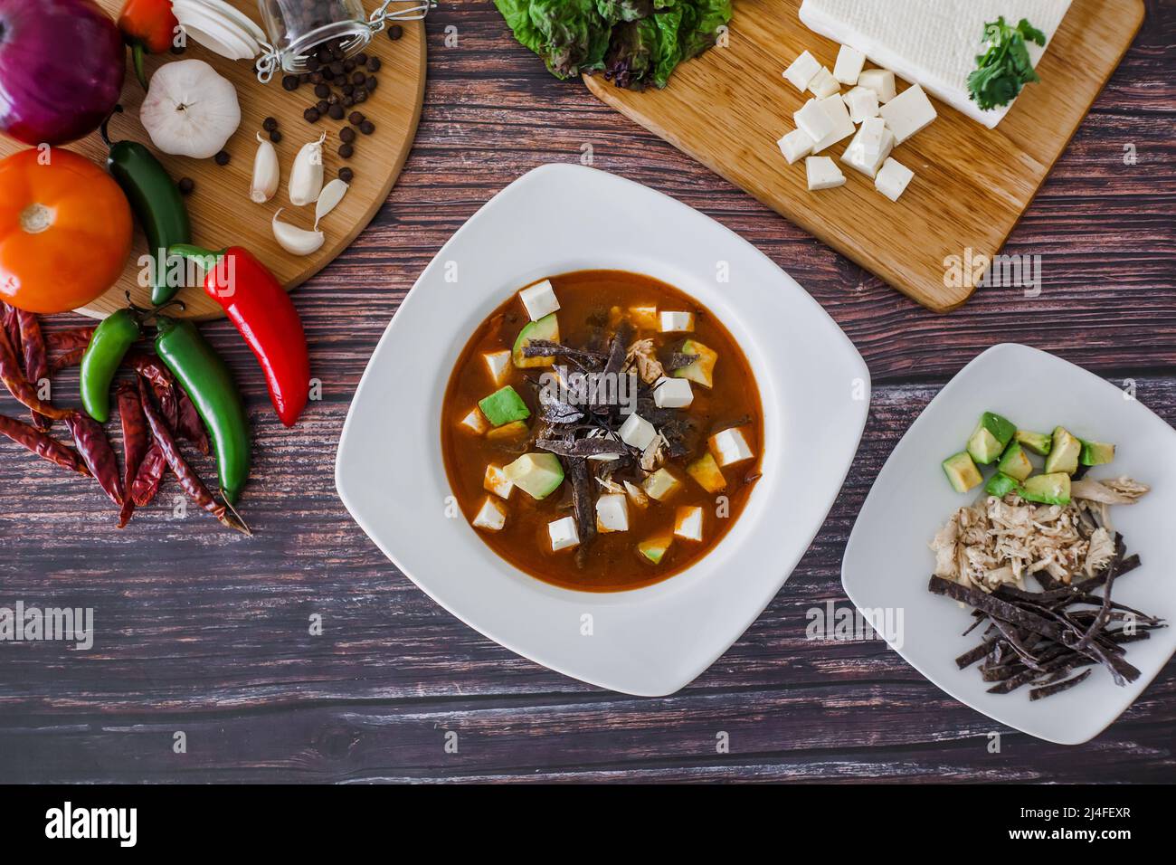 Mexican Tortilla Soup with Chili and ingredients traditional food in Mexico Stock Photo