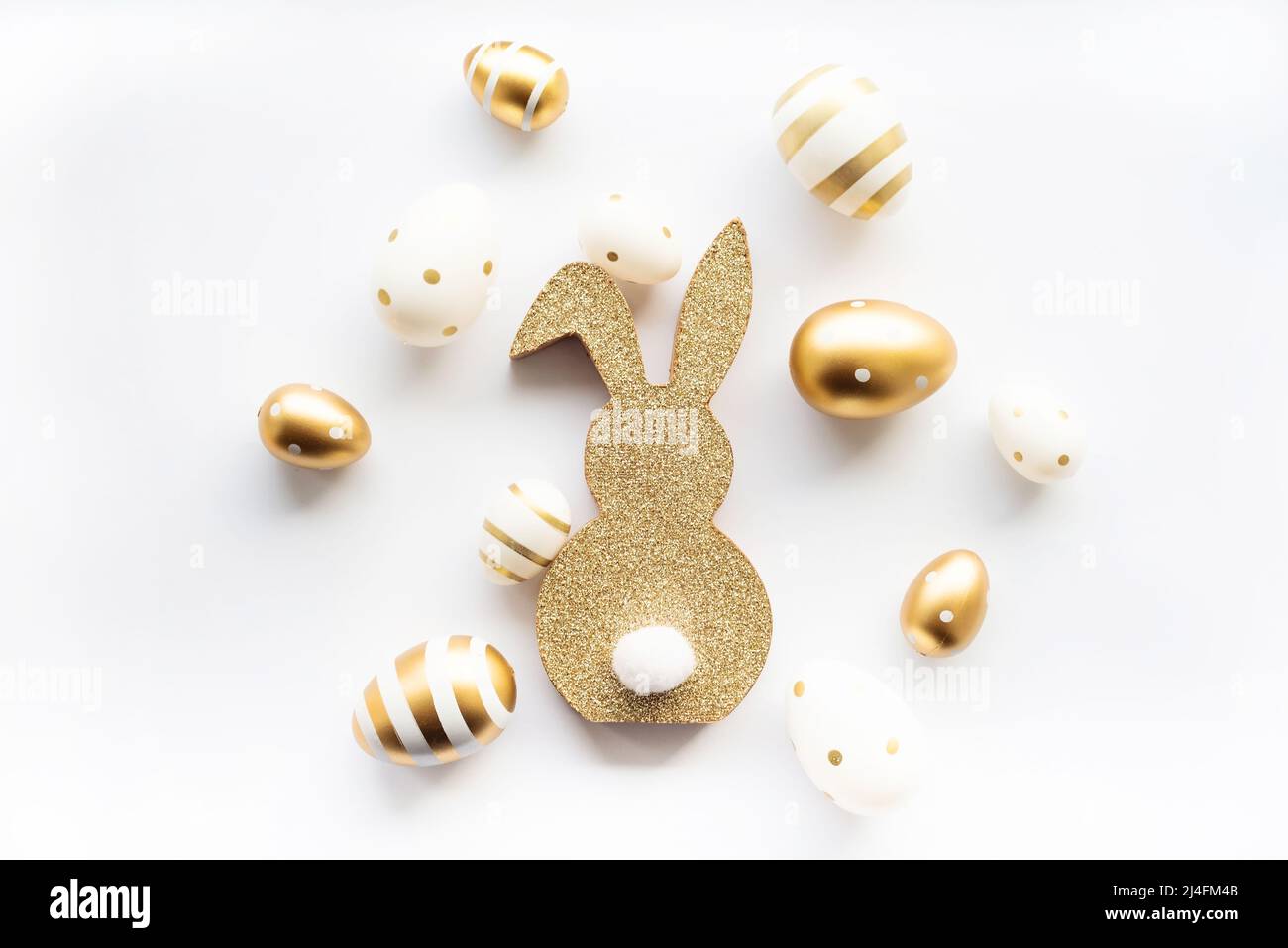Cute easter bunny and golden eggs isolated on white background. Happy ...
