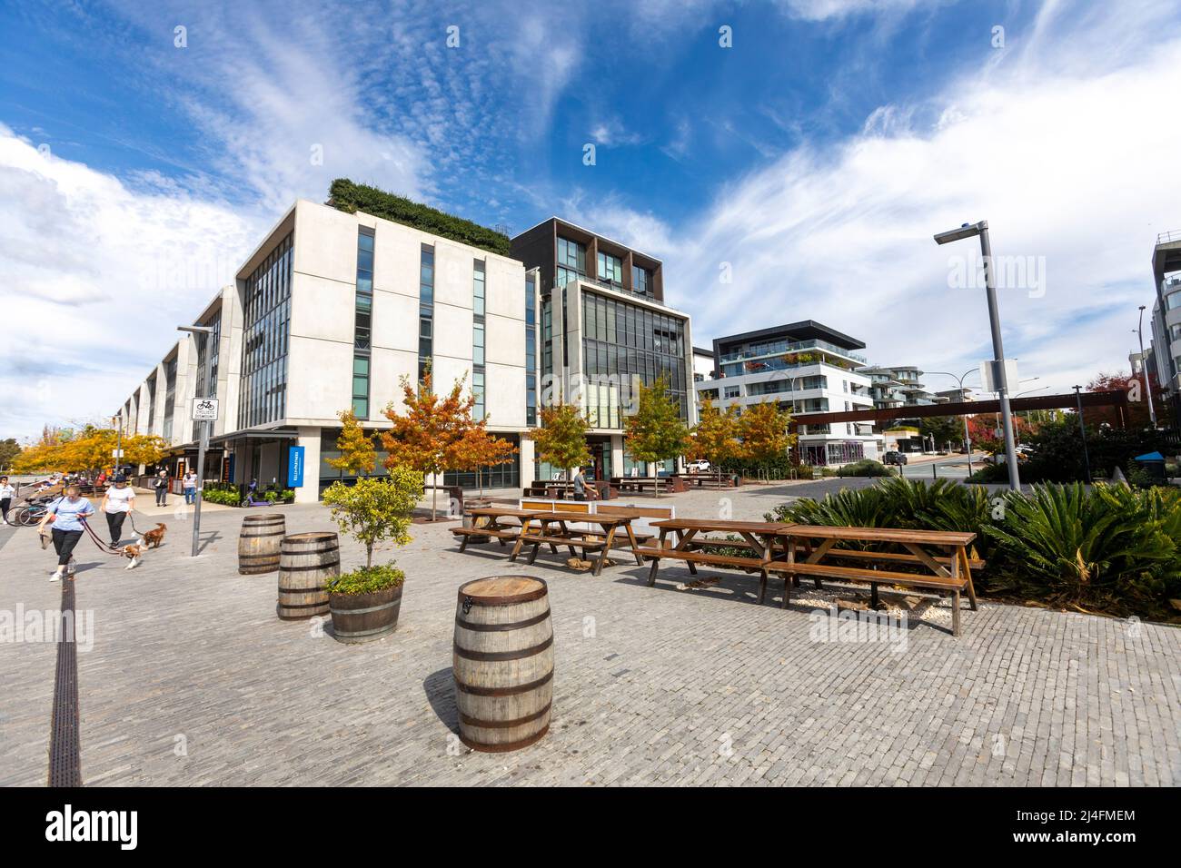 Kingston foreshore in Canberra with lake burley griffin and autumn colours on the leaves in this mixed use foreshore development,Australia Stock Photo