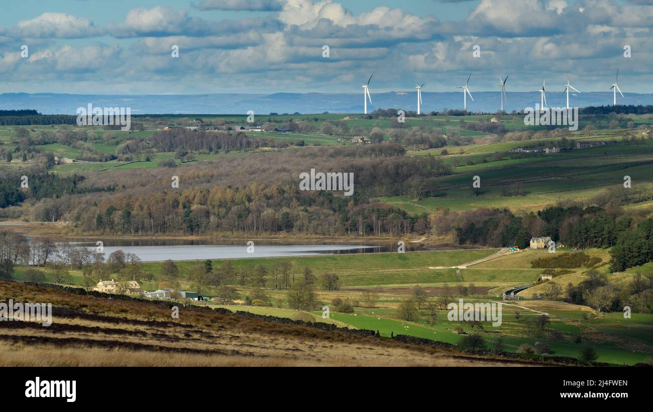 Scenic rural Washburn Valley (Swinsty reservoir, farmland pastures, tall high giant turbine towers, Hambleton Hills) - North Yorkshire, England, UK. Stock Photo