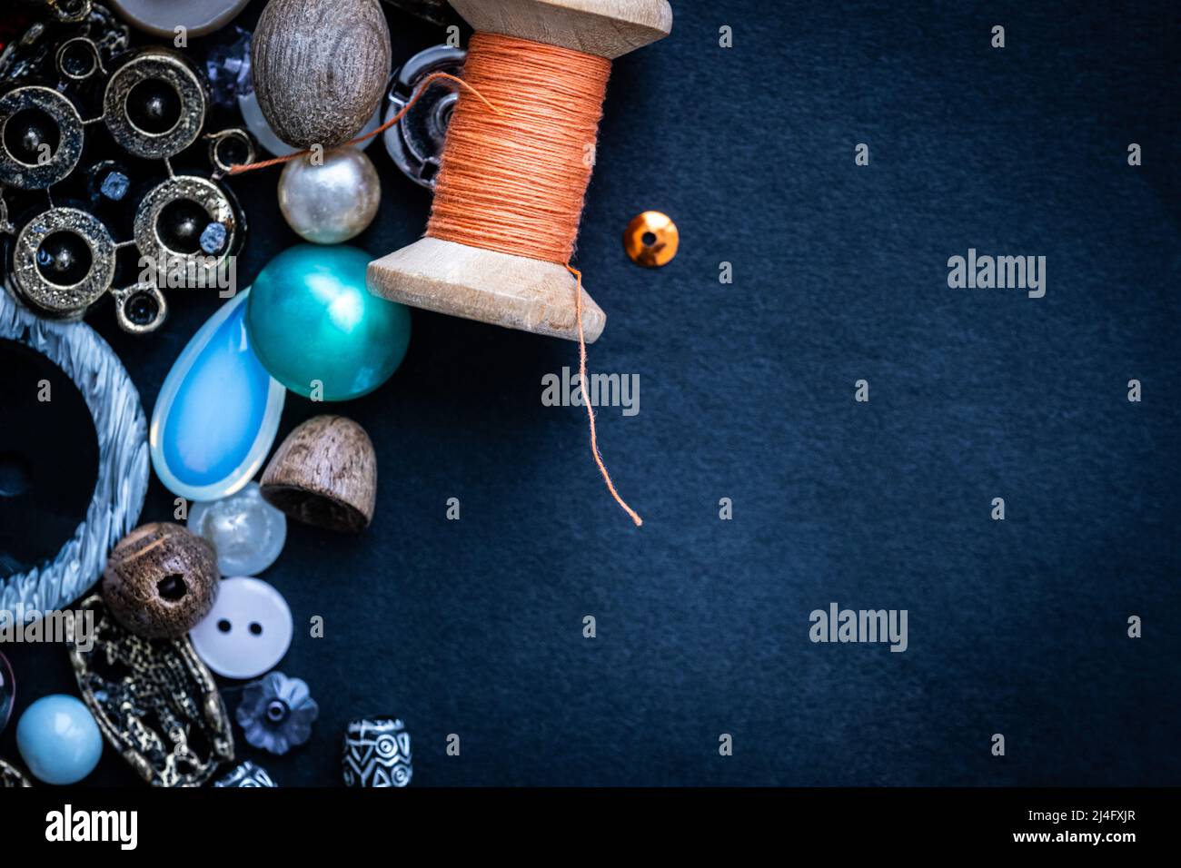 Sewing accessories on blue background Stock Photo