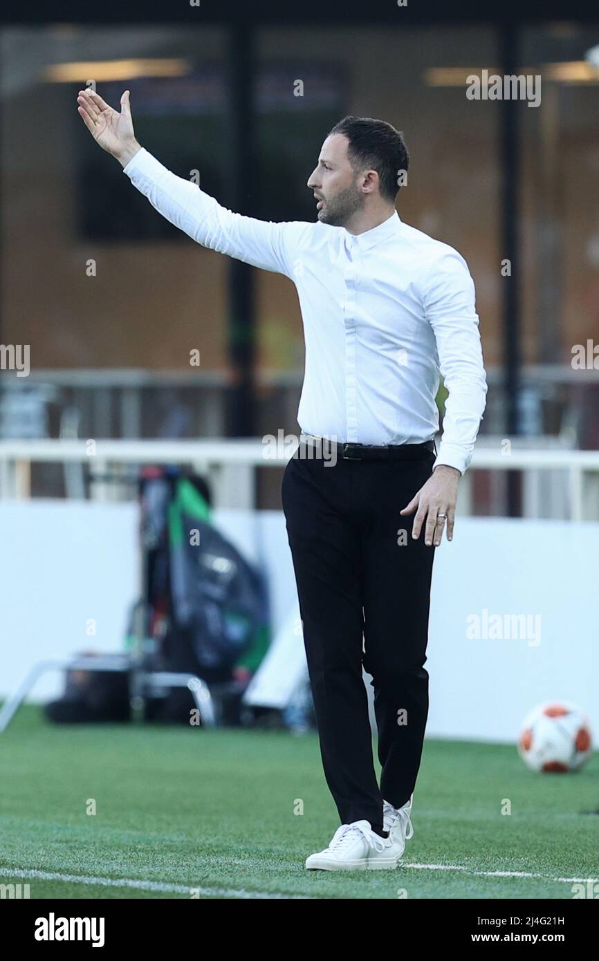 Head coach Senol Gunes of Besiktas J.K. watches his players competing  against FC Schalke 04 in a friendly soccer match in Zhuhai city, south  China's G Stock Photo - Alamy