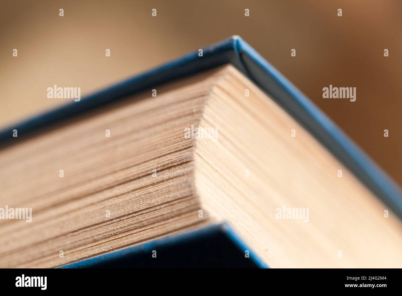 Closed vintage book, macro photo with selective focus Stock Photo