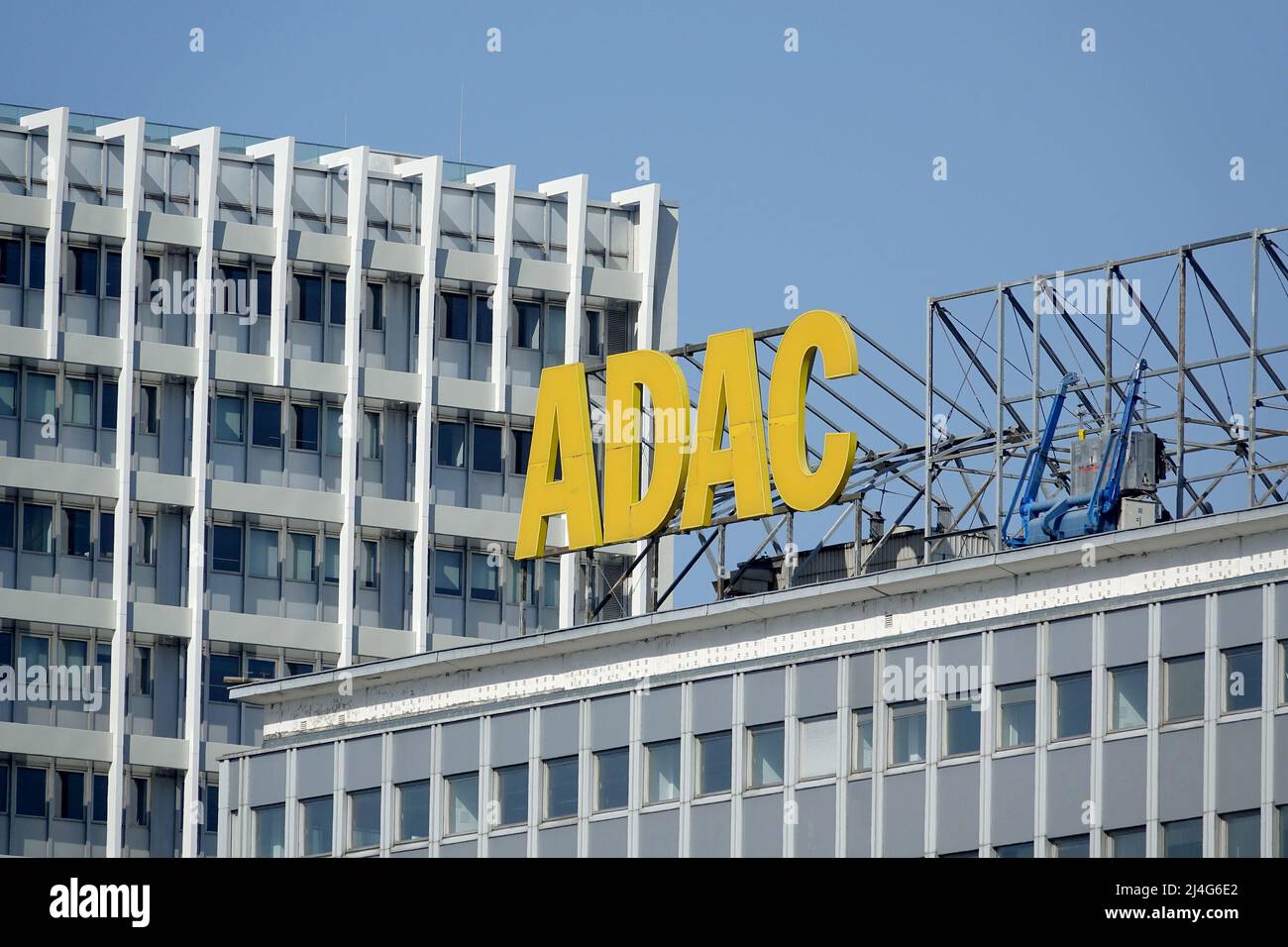 Berlin, Germany. 21st Mar, 2022. The logo of the ADAC, Allgemeine Deutsche Automobil-Club e. V. (German Automobile Club), is displayed on the roof of a house at Alexanderplatz. Credit: Alexandra Schuler/dpa/Alamy Live News Stock Photo