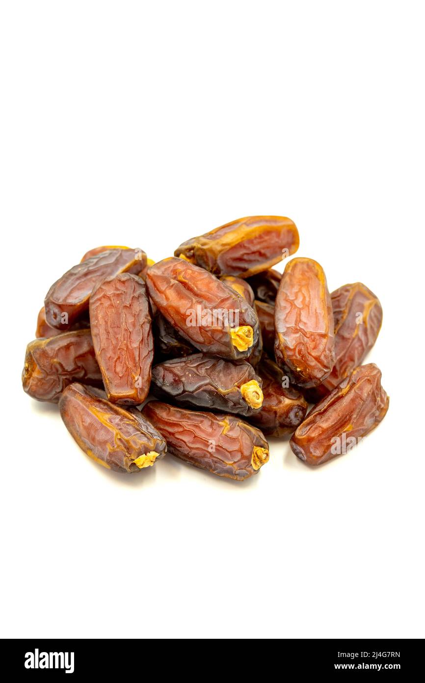 Date fruit isolated on a white background. Ripe date fruit or Medjoul. close up Stock Photo