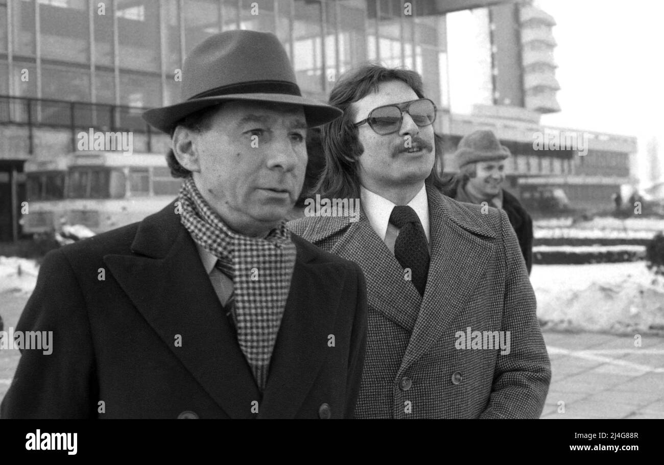 Bucharest, Romania, 1980. Musicians Ion Voicu & Madalin Voicu waiting at the airport for the arrival of famous conductor Sergiu Celibidache. Stock Photo