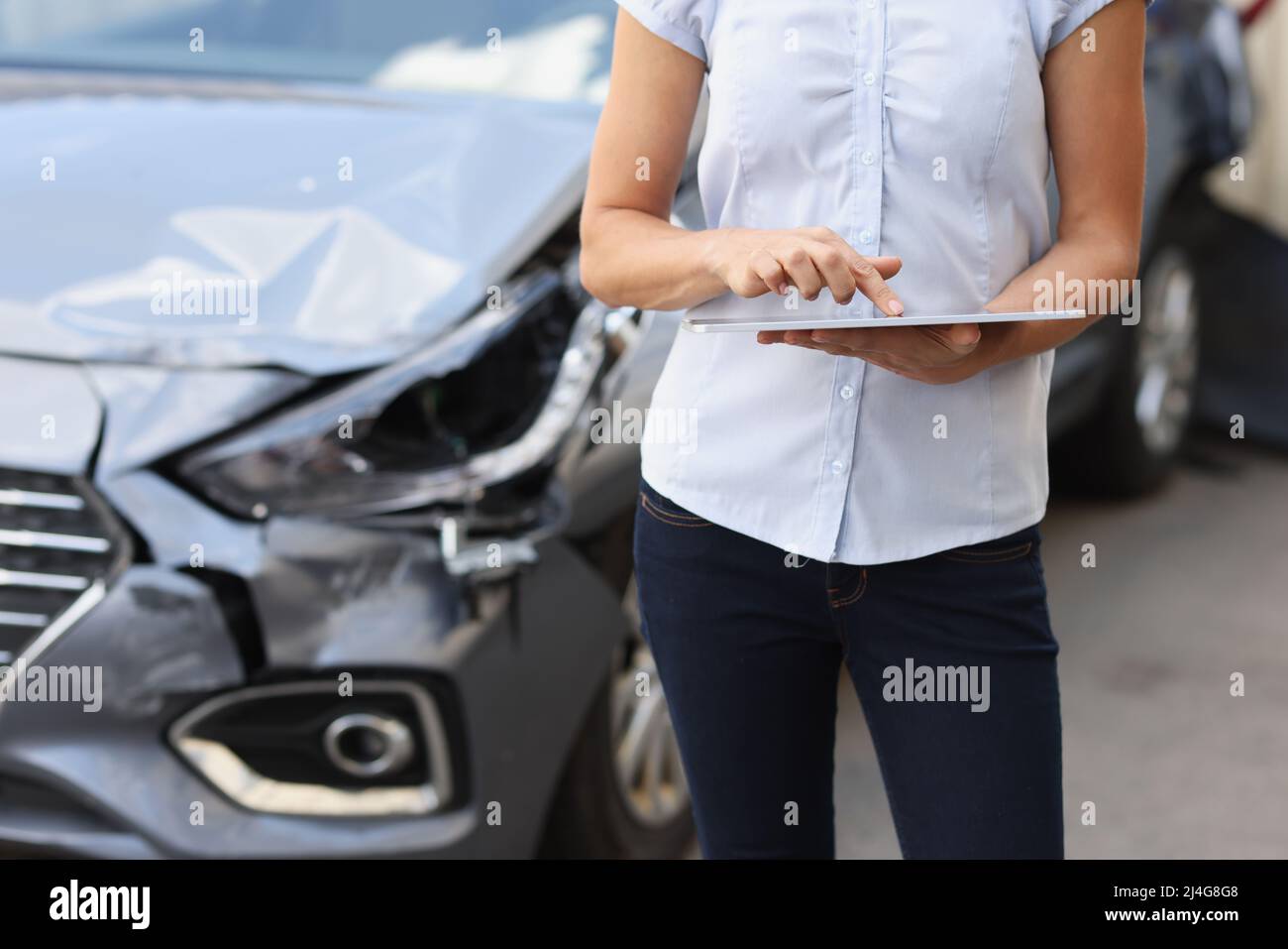 Registration of damage to car after accident Stock Photo Alamy