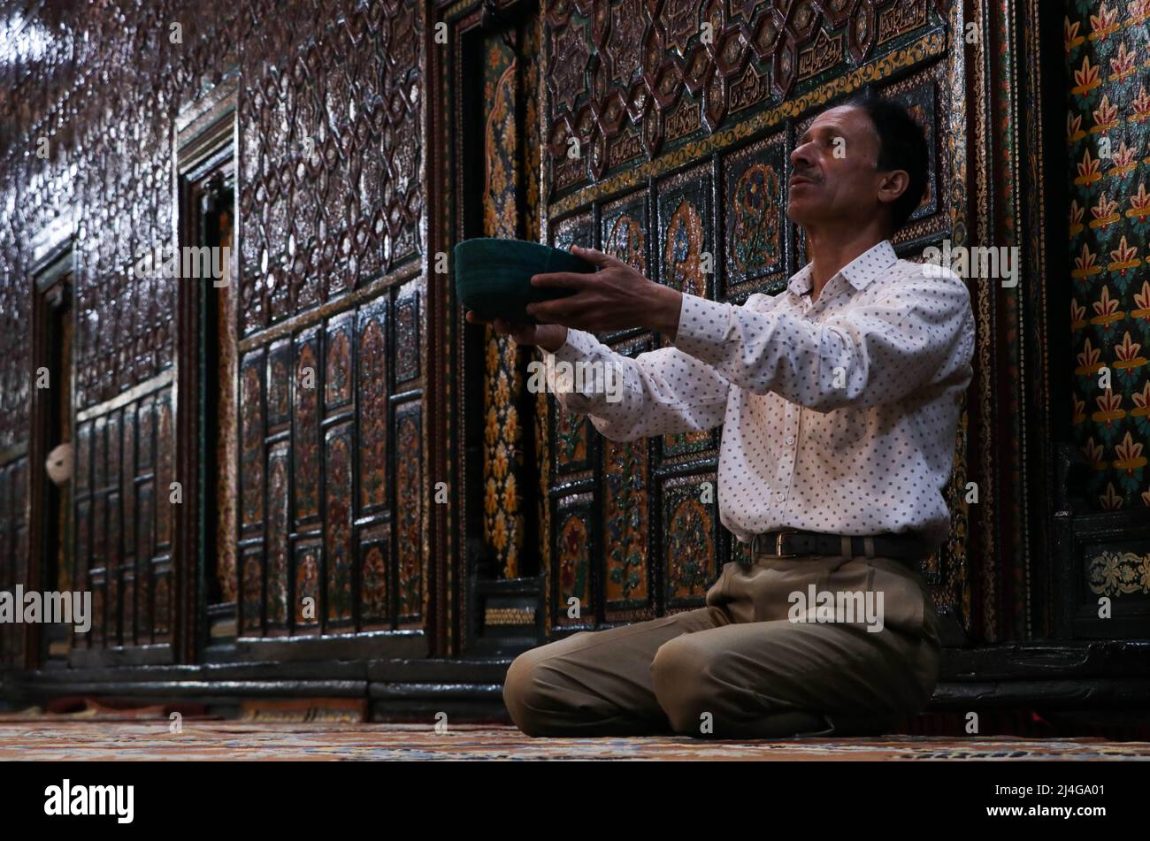 Srinagar, Kashmir, India. 15th Apr, 2022. A Muslim man prays inside the ...