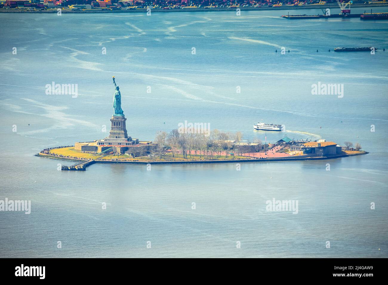 The Statue of Liberty and Liberty island in New York City aerial view ...