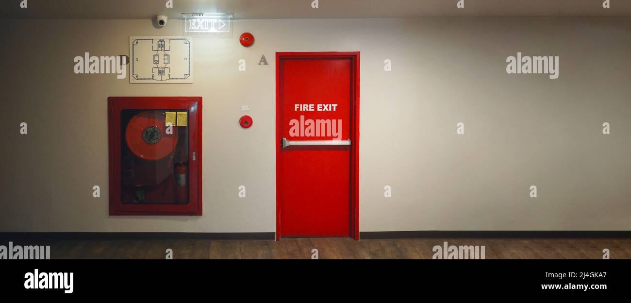 Fire exit door. Fire exit emergency door red color metal material with ...
