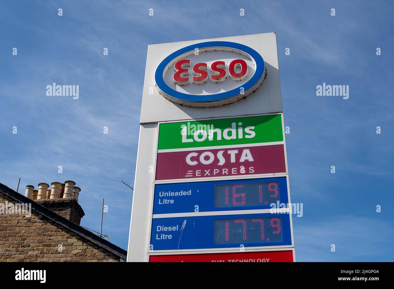 Egham, Surrey, UK. 15th April, 2022. The Esso petrol station in Egham was short on fuel today. Following the blockade of fuel depots by Just Stop Oil activists, many petrol stations in the South East of England still have petrol shortages. Credit: Maureen McLean/Alamy Live News Stock Photo