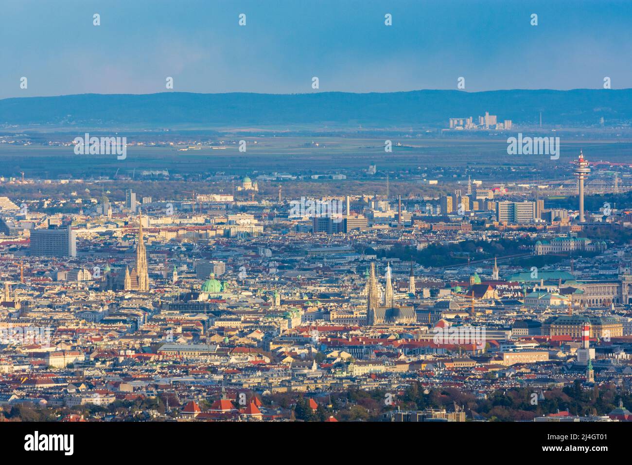 Wien, Vienna: Vienna city center with  cathedral Stephansdom (St. Stephen's Cathedral), church Votivkirche, radio tower Wien-Arsenal and mountain Leit Stock Photo