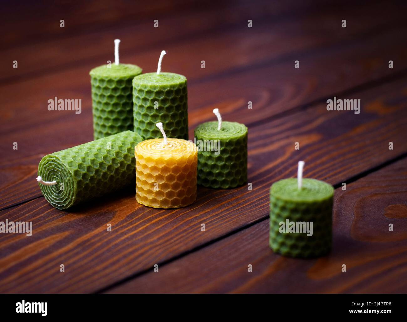 natural Beeswax candles in shape rose, handmade of craft candles, made for  holiday, art and health on dark background, copy spase Stock Photo - Alamy
