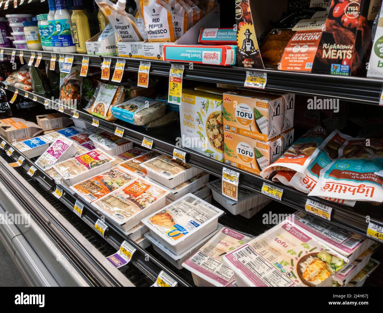 Woodinville, WA USA - circa April 2022: Angled view of meatless and meat alternative products in the refrigerated section of a Haggen grocery store Stock Photo