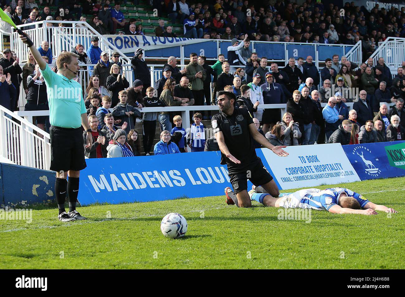 HARTLEPOOL, UK. APR 15TH Lines awards the free kick to Hrtlepool during the Sky Bet League 2 match between Hartlepool United and Port Vale at Victoria Park, Hartlepool on Friday 15th April 2022. (Credit: Harry Cook | MI News) Credit: MI News & Sport /Alamy Live News Stock Photo