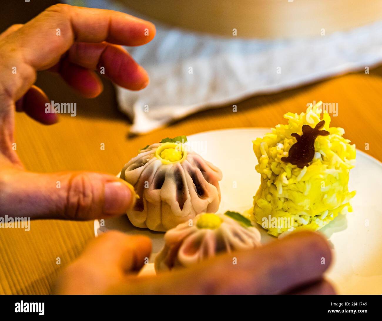 Preparation of moon viewing tsukimi, traditional Japanese sweets eaten every year on the occasion of the full moon in autumn and decorated with a rabbit. Izu, Japan Stock Photo