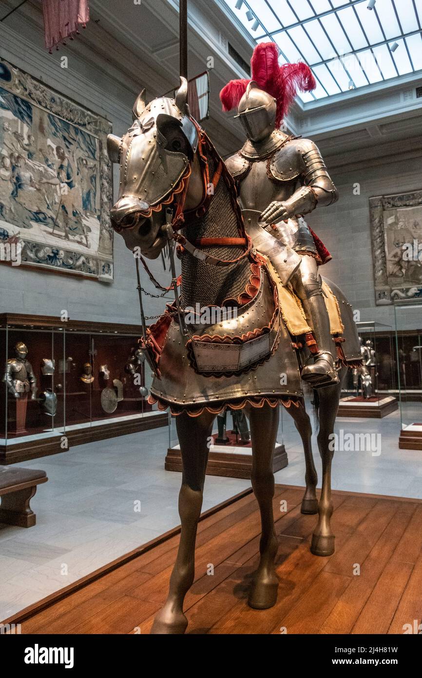 knight on a horse wearing armor from the the European Middle Ages Stock