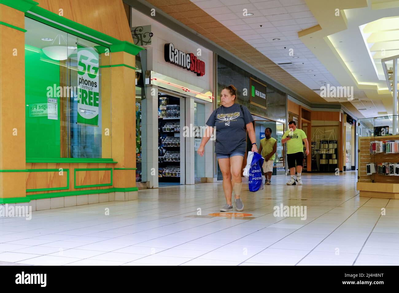 Shoppers walk past stores in the Susquehanna Valley Mall. Stock Photo