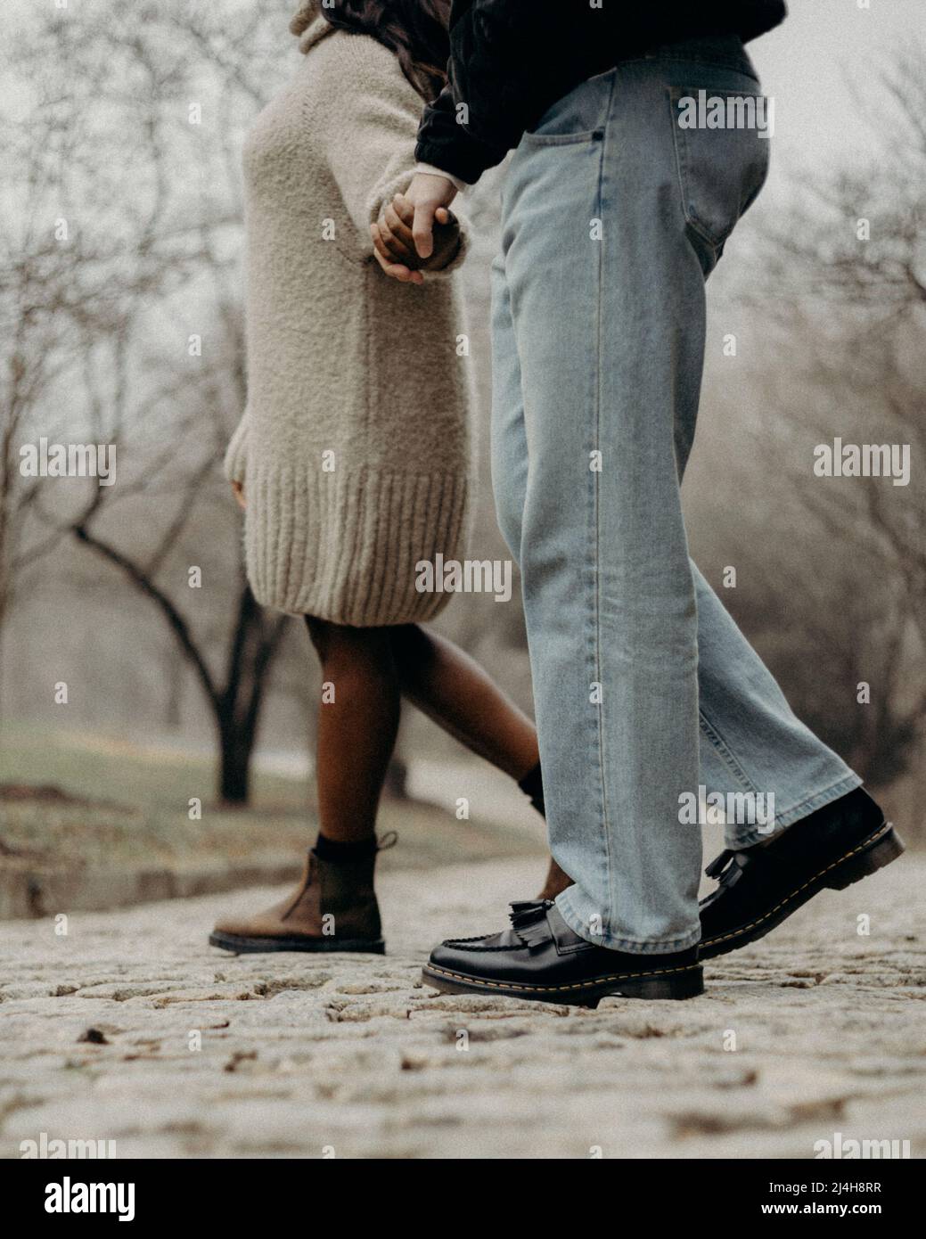 Girl guy holding hands walking hi-res stock photography and images - Alamy
