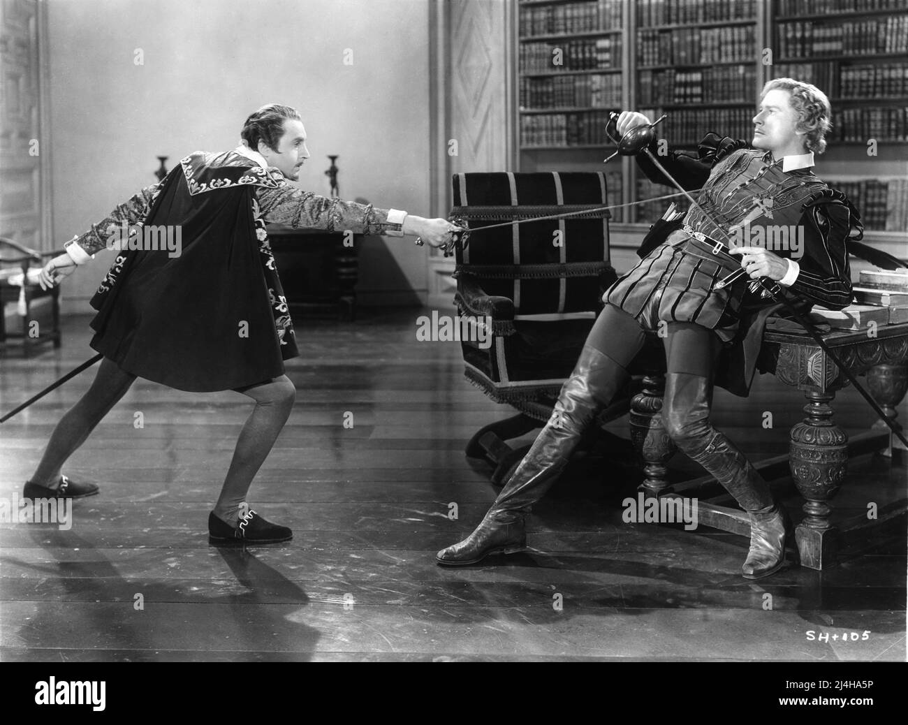 HENRY DANIELL and ERROL FLYNN in THE SEA HAWK 1940 director MICHAEL CURTIZ writers Howard Koch and Seton I. Miller costumes Orry-Kelly music Erich Wolfgang Korngold Warner Bros. Stock Photo