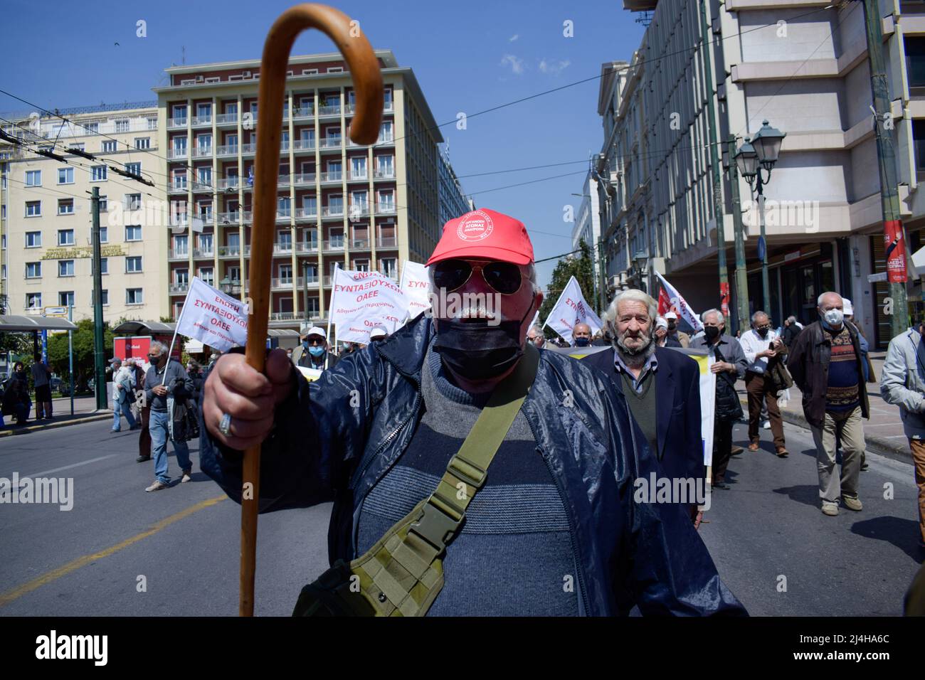 Athens, Greece. 14th Apr, 2022. A pensioner gestures as thousands march holding banner with slogans against soaring unbearable prices that plague Greek society. (Photo by Dimitris Aspiotis/Pacific Press) Credit: Pacific Press Media Production Corp./Alamy Live News Stock Photo