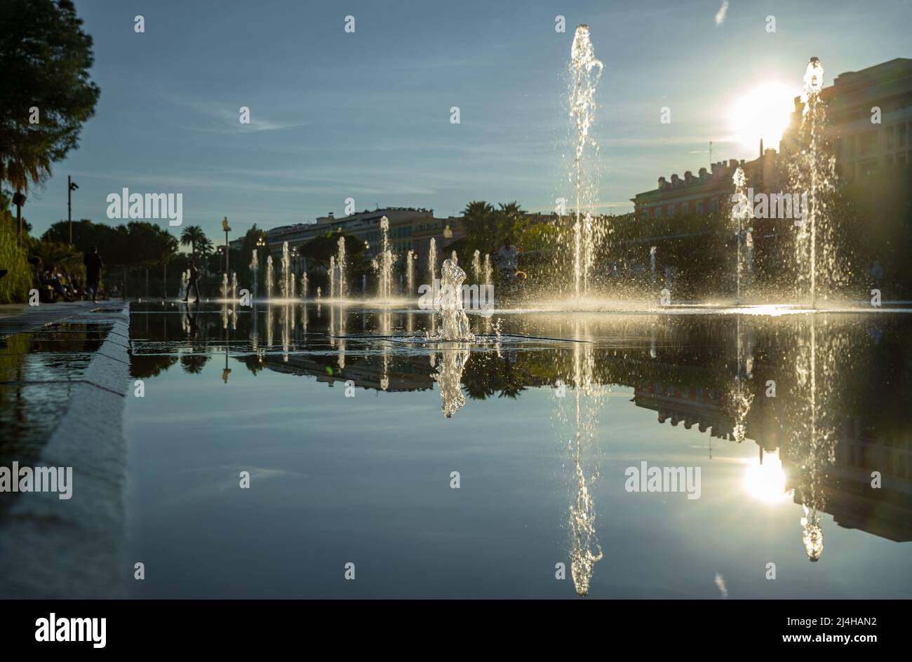 France, Nice, Famous place of Nice, square of fountain, mirror of water, sun reflection Stock Photo