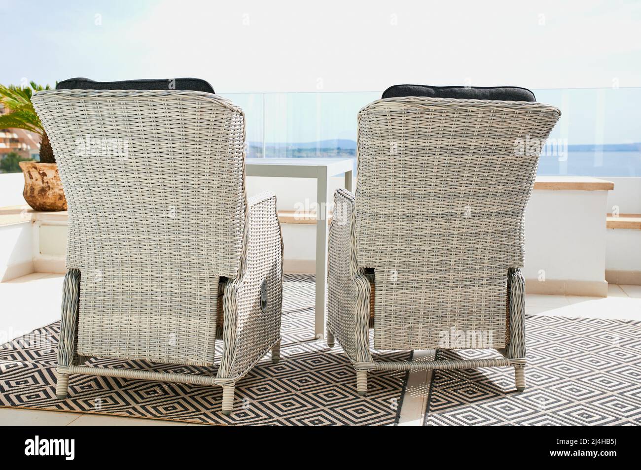 Two chairs on balcony hi-res stock photography and images - Alamy