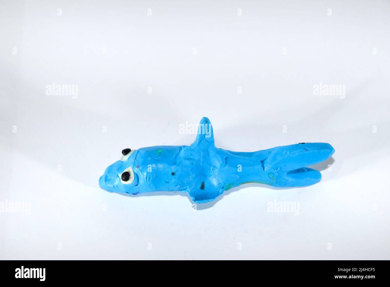 Plasticine shark. Plasticine toys on a white background Stock Photo