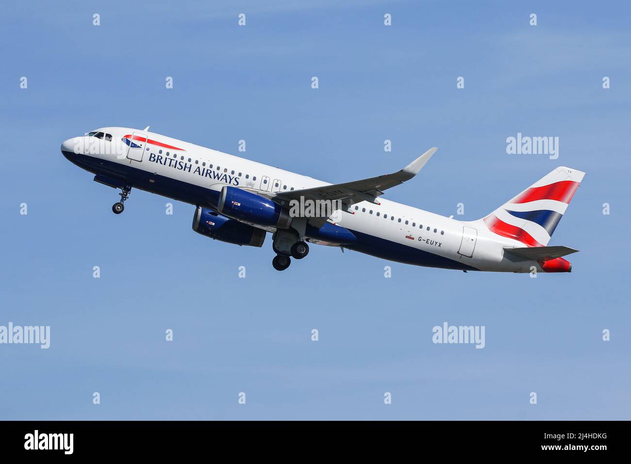 An Airbus A320 operated by British Airways departs from London Heathrow Airport Stock Photo