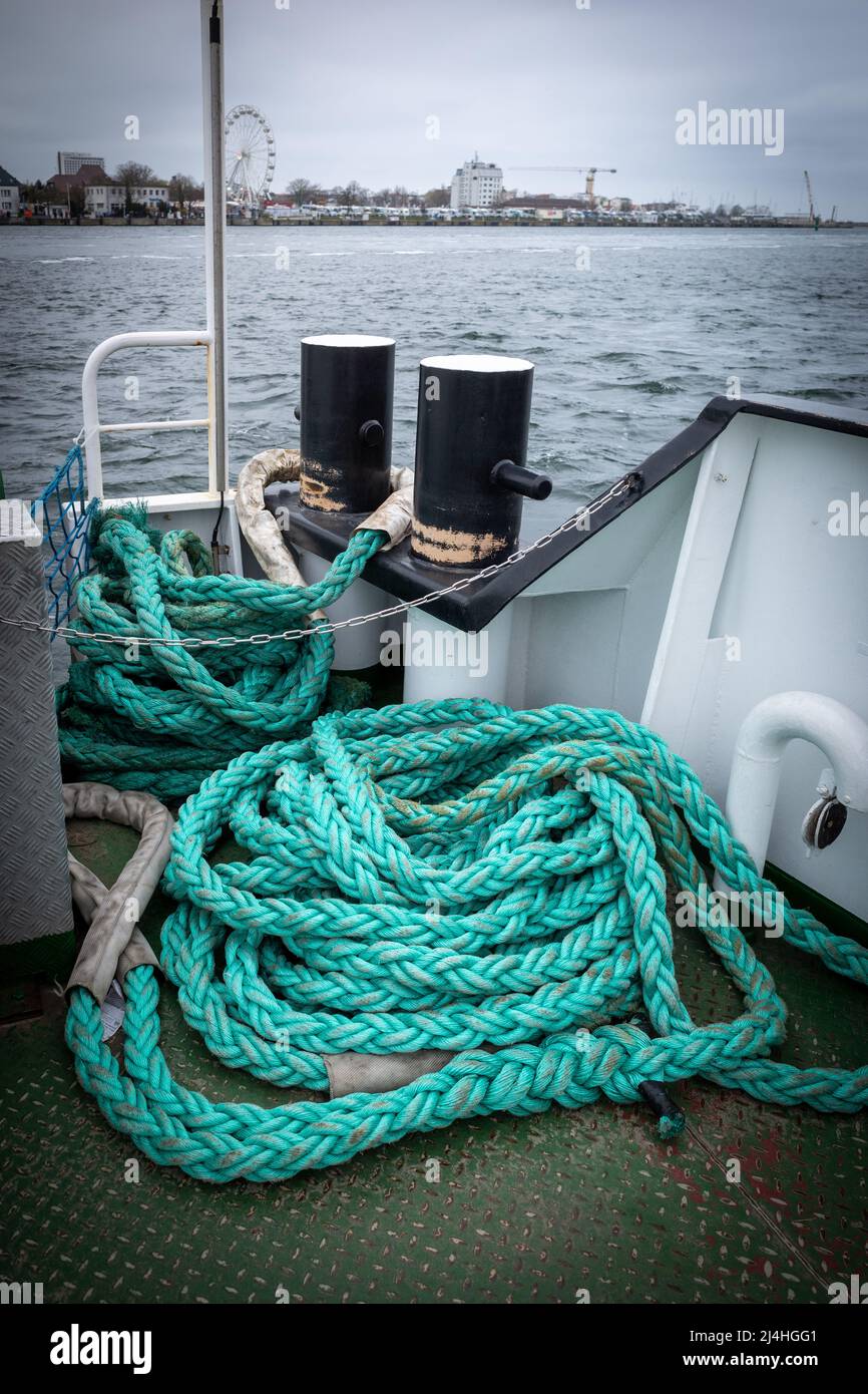 on a deck of a ship lie long ropes for mooring the ship Stock Photo - Alamy