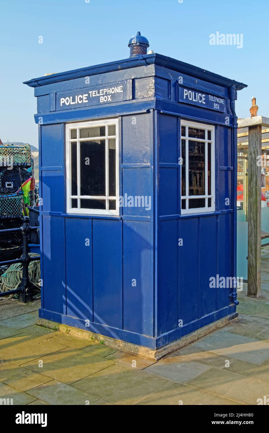 UK, North Yorkshire, Scarborough, Blue Police Telephone Box on Sandside. Stock Photo