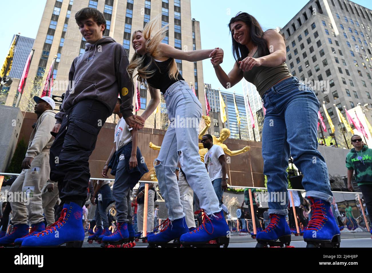 People rollerskate at the opening day of Flippers Roller Boggie Palace