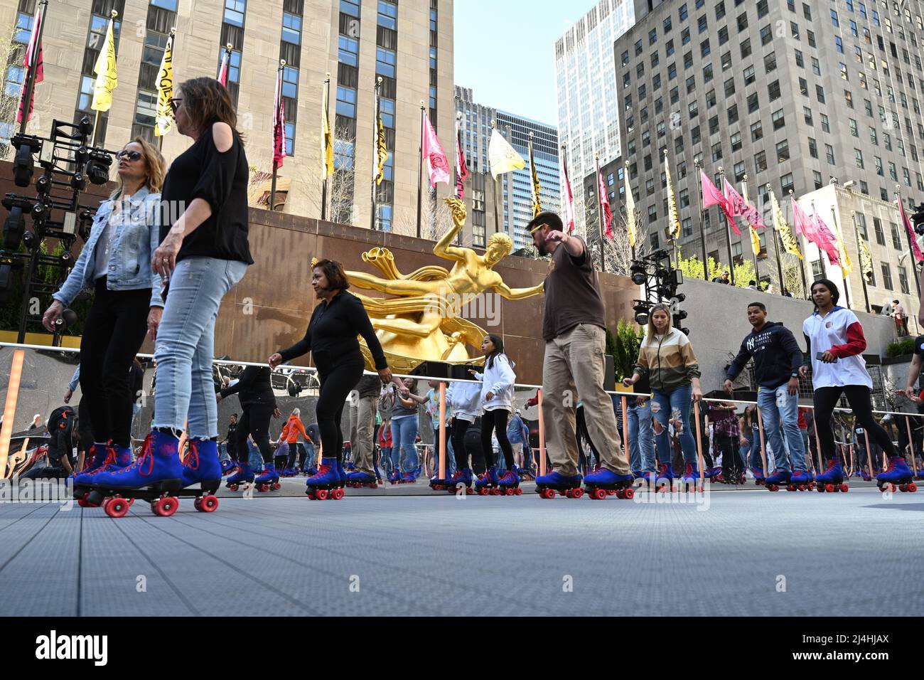People rollerskate at the opening day of Flippers Roller Boggie Palace