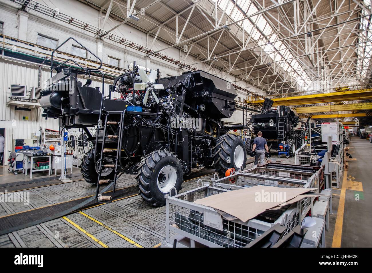 Assembly Design Tractor The process of assembling agricultural tractors and harvesters on the ...