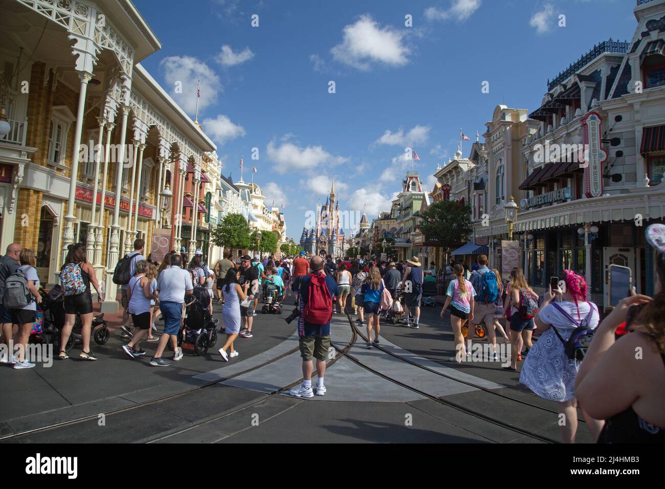 Magic Kingdom theme park, Orlando, Florida, USA, March 28th 2022, crowds wander at Disney's Magic Kingdom theme park. Stock Photo