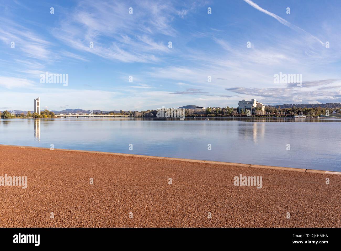 National Carillon and Australian High Court building on the shores of Lake Burley Griffin in Canberra on a sunny autumn day,ACT,Australia Stock Photo