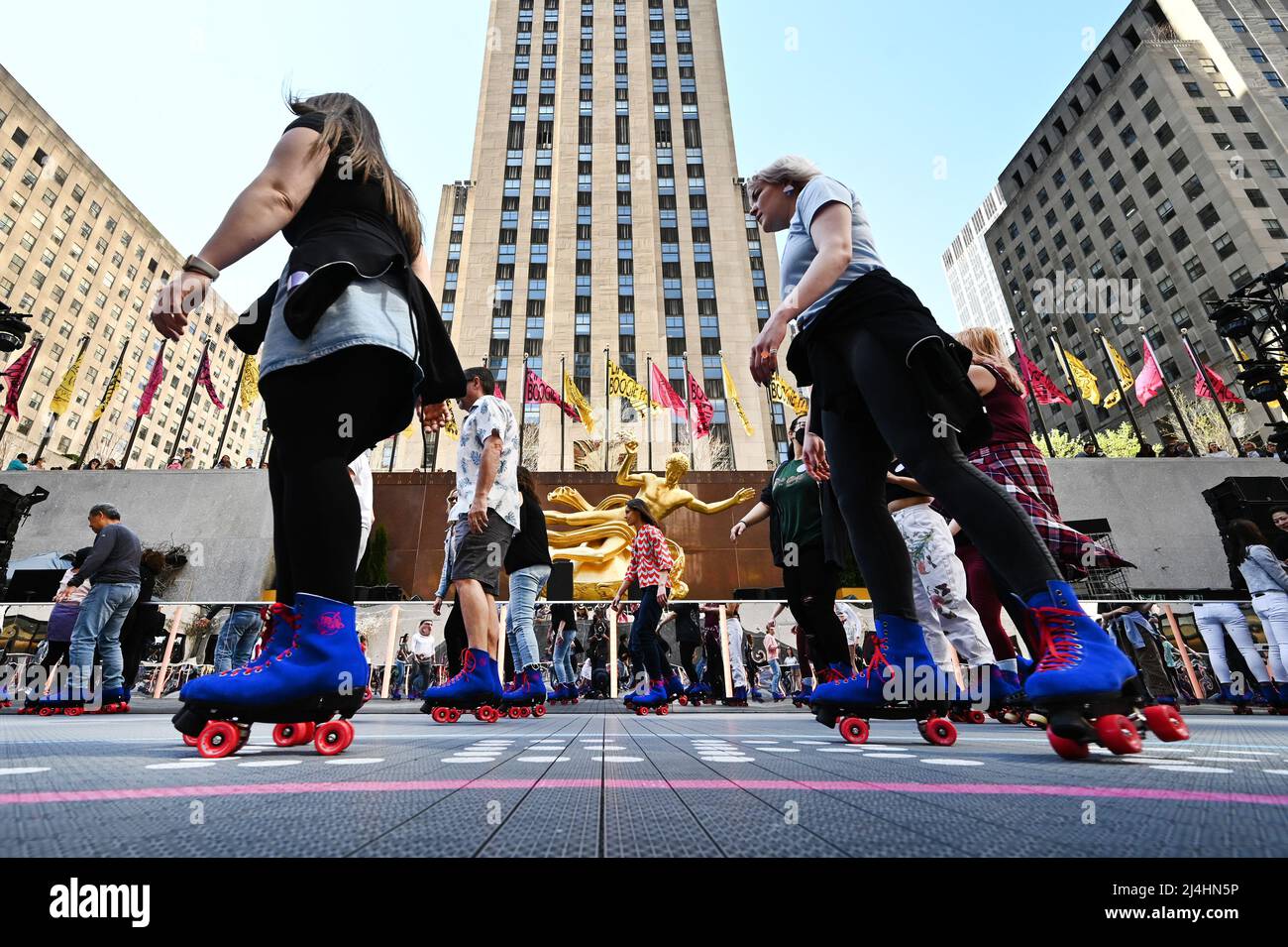 People roller skate on opening day at Flippers Roller Boogie Palace NYC