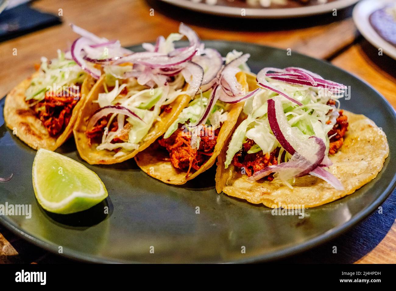 Tacos with vegetables typical Mexican meat, very spicy Stock Photo Alamy