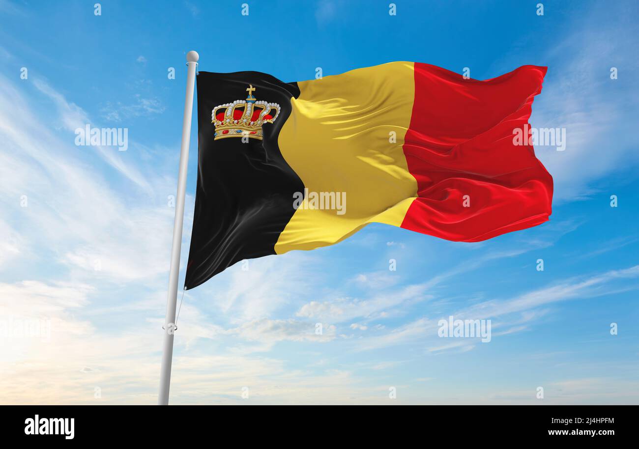 official flag of Belgium with crown, Belgium at cloudy sky background