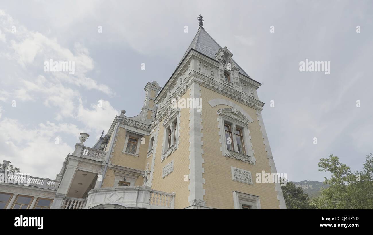 Bottom view of old country palace. Action. Beautiful architecture of